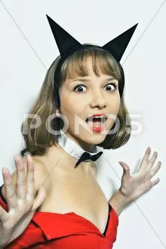 Young woman in carnival costume with horns Stock Photos