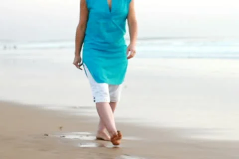 Young woman checking a man at the beach, steadicam shot 스톡 동영상 10791864