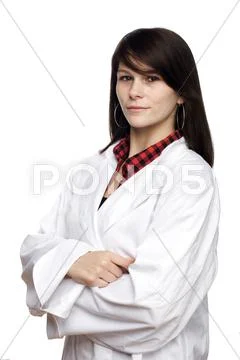 Young woman in chef jacket Stock Photos