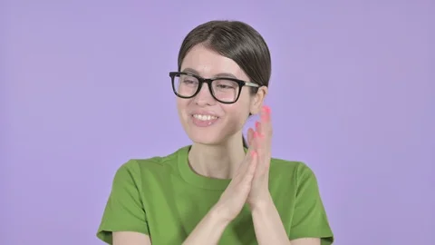 Young Woman Clapping with Hands on Pink... | Stock Video | Pond5