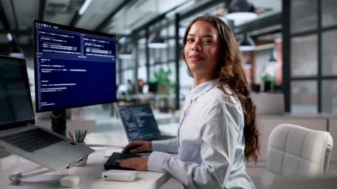 Young Woman Coder Happily Working Stock Footage 336377146