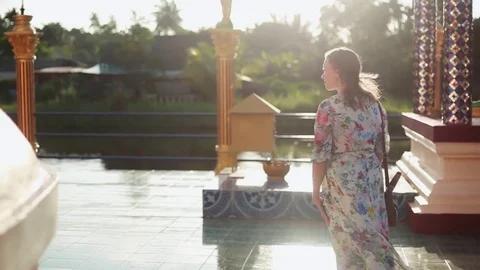 Young woman coming in temple complex Wat Plai Laem on Koh Samui, 1920x1080 Stock Footage