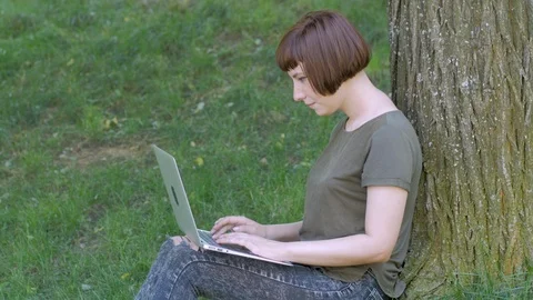 Young woman with computer Stock Footage 114578085