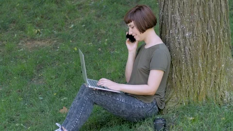 Young woman with computer Stock Footage 114578147