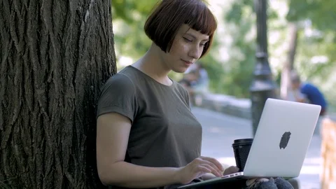 Young woman with computer Stock Footage 114578201