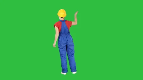 Young woman construction worket doing expressive gestures talking to crawd on a Stock Footage 101028655