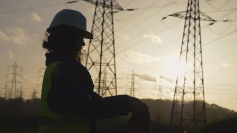 Young Woman Constructor clean his gloves in Slow motion footage.on field with Stock Footage 149487656