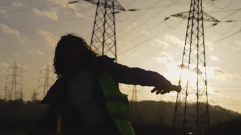 Young Woman Constructor Happiness dancing and jumping with his helmet. Ethnic Stock Footage 149487740