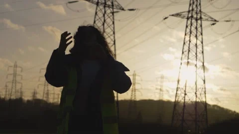 Young Woman Constructor Happiness dancing and jumping with his helmet. Ethnic Stock Footage 149487769