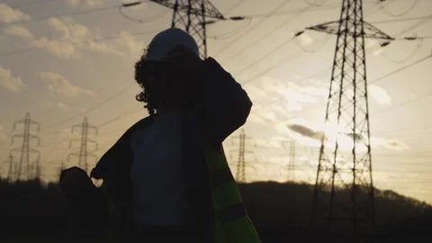 Young Woman Constructor Jump in screen in Slow motion footage.on field with e Stock Footage 149487663