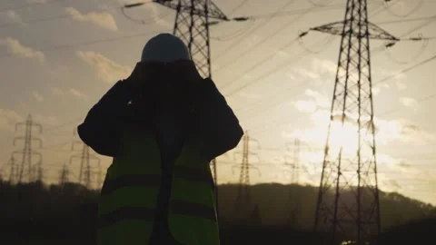 Young Woman Constructor worker with curly hair put his helmet in funny way. S Stock Footage 149487761