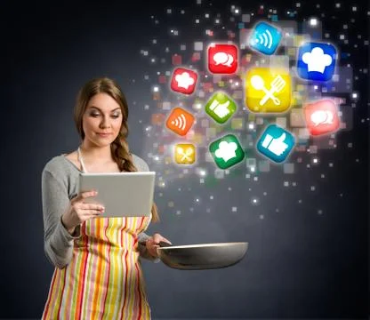 Young woman cooking using the tablet Stock Illustration