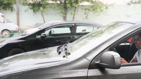 Young Woman crashed while Parking a car.Car accident on the road. Stock Footage 137561599