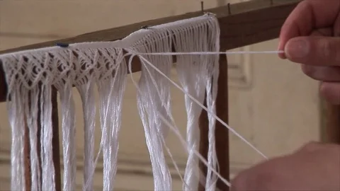 Young woman creates fabrics with a craftsmanship Stock Footage 75813496