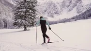 Young Woman Cross Country Skiing In Valley Covered In Snow Stock Footage