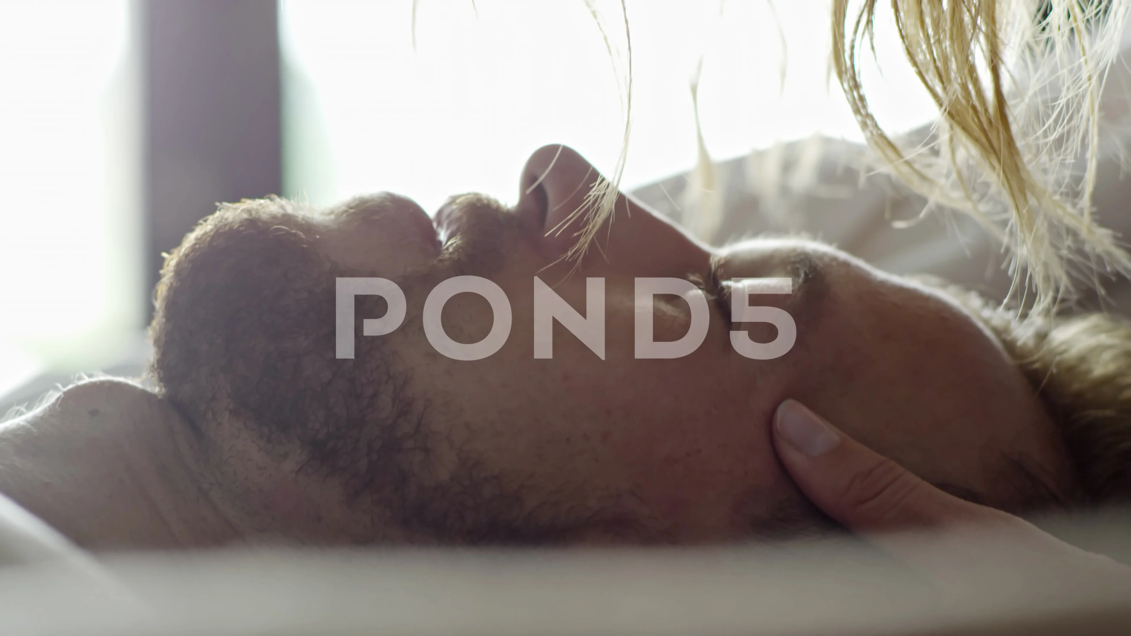 Young Woman Cuddling with Boyfriend | Stock Video | Pond5