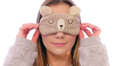 Young Woman with a Cute Sleep Mask Holding it up and Smiling Stock Footage 59191828