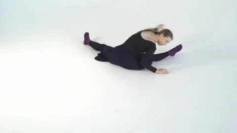 Young woman dancer dancing on white isolated background. White background, black Stock Footage 85772601