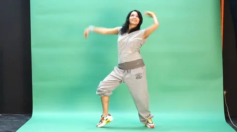 Young woman dancing in action Stock Footage