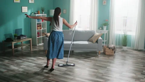 Young Woman Is Dancing with Mop Stock Footage 164734853