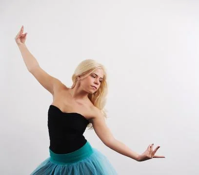 Young woman dancing Stock Photos