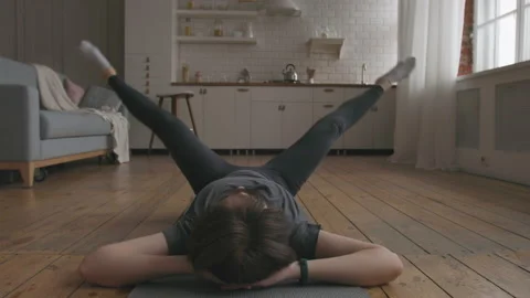 Young Woman Doing Core Workout Stock Footage 151438652