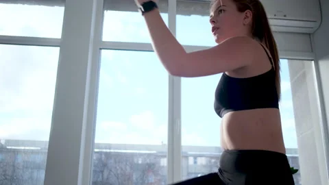 Young woman doing fitness exercise Stock Footage 172263243