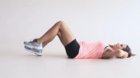 Young woman doing situps Stock Footage 62207959