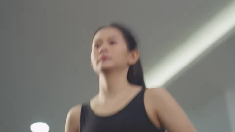 Young woman doing squat exercise in gym. Stock Footage 308125703