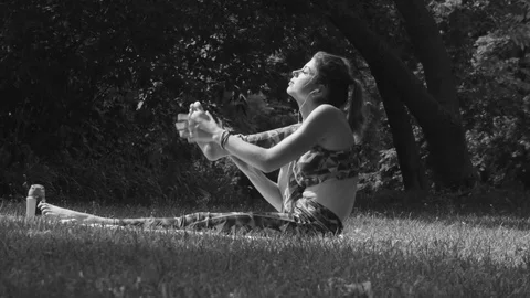 Young woman doing yoga exercises Stock Footage