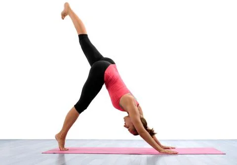 Young woman doing yoga Stock Photos