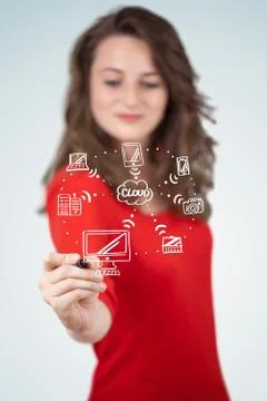 Young woman drawing a cloud computing on whiteboard 写真素材