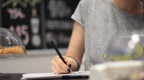 Young woman Drawing A Marker. black nail Polish Stock Footage 54751908