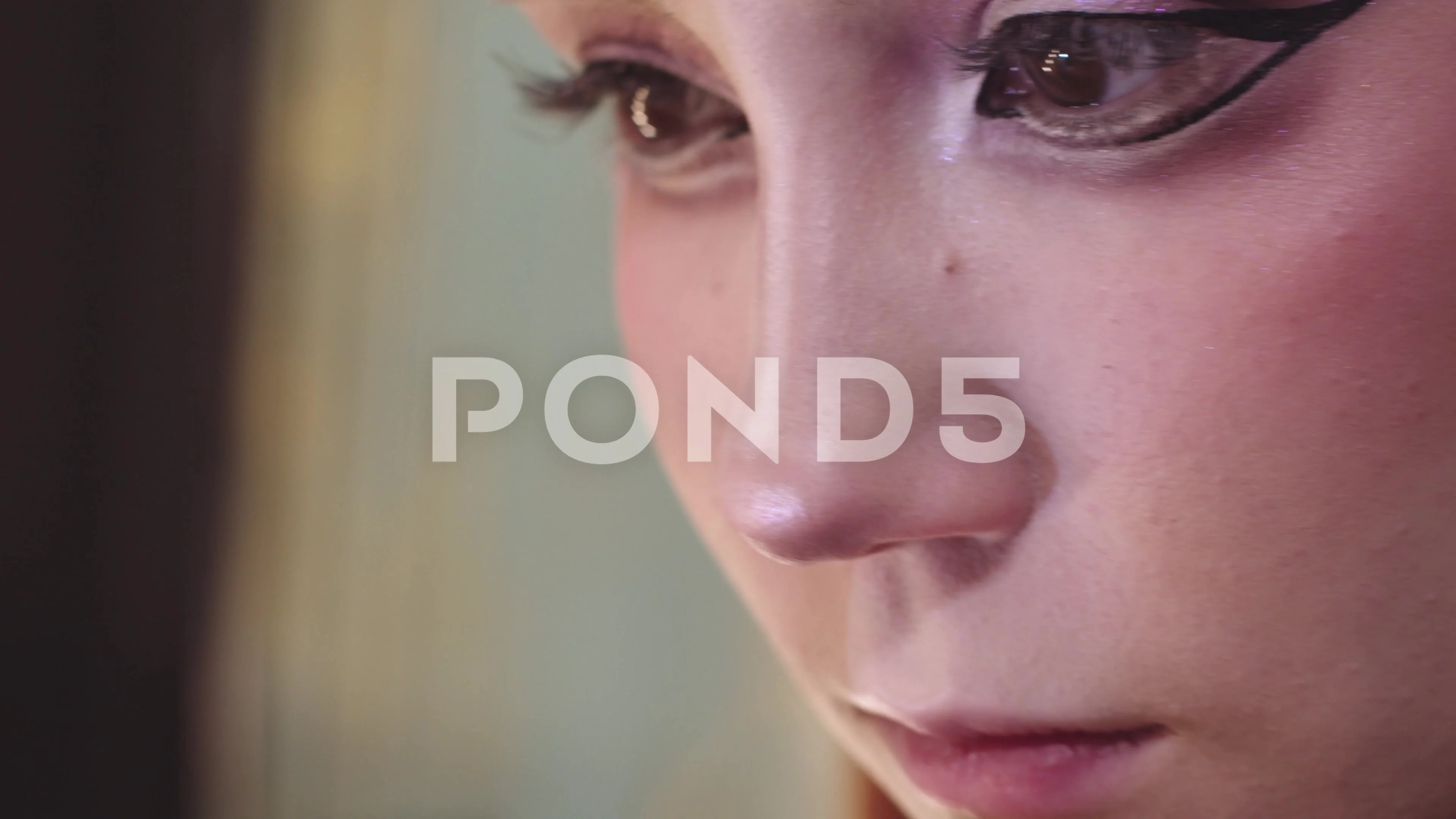 Young woman drawing winged anime eyeline... | Stock Video | Pond5