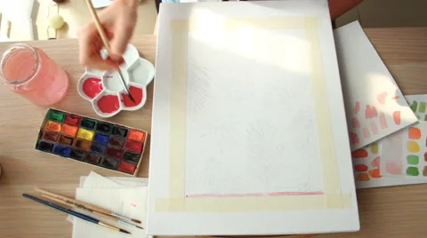 A young woman draws a pattern. Time lapse Stock Footage 67376520