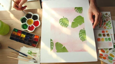 A young woman draws a pattern. Time lapse Stock Footage 67376529