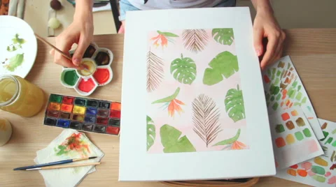 A young woman draws a pattern. Time lapse Stock Footage 67376541
