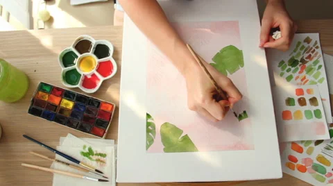 A young woman draws a pattern. Time lapse Stock Footage 67376560