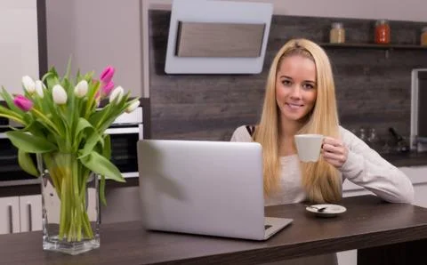 Young woman drinking coffee Stock Photos