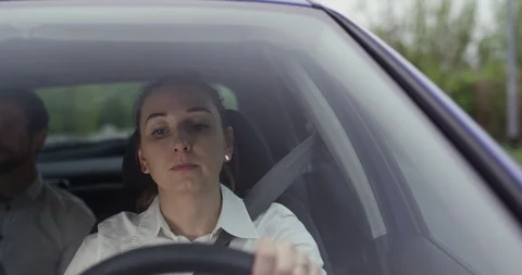 Young woman driver in Uber Stock Footage 109495053