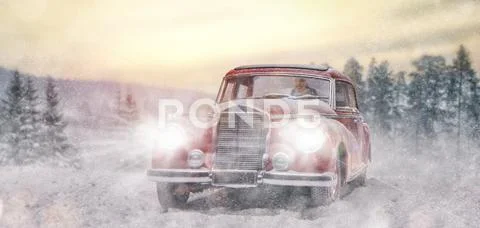 Young woman drives vintage car Stock Photos