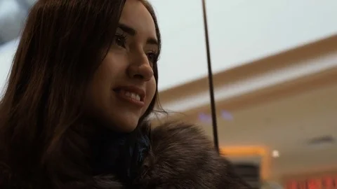 Young woman in elevator Stock Footage 69996653