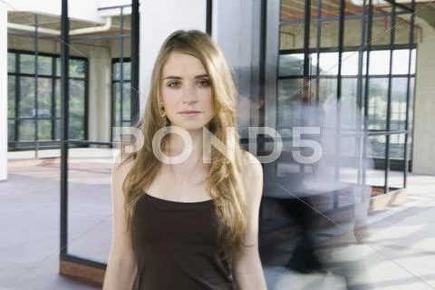 Young woman in empty house Stock Photos