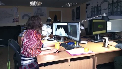 Young woman engineer working on computer in office. Stock Footage 81531498