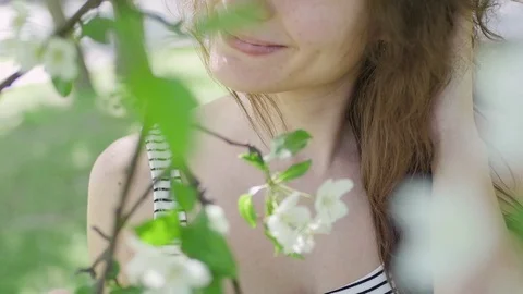 Young woman enjoying in the background of the tree Stock Footage