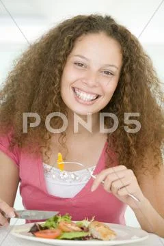 Young woman enjoying healthy meal,mealtime Stock Photos