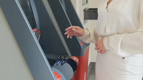 Young woman entering PIN code at ATM machine in the city in slow motion Stock Footage 95301151