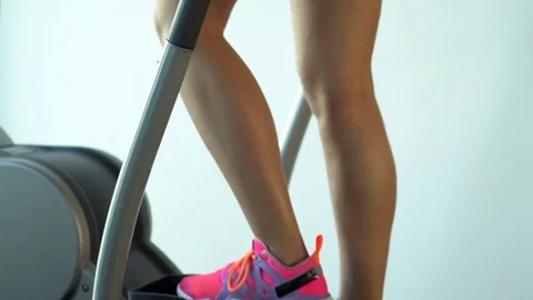 Young woman exercising on a stepper apprentice Stock Footage 80217481