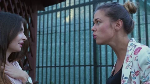 Young woman is explaining something to another offended woman. Stock Footage 67566865