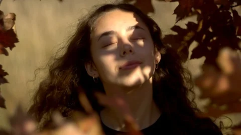 Young woman at fall Stock Footage 97317832